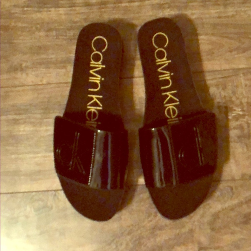 Calvin Klein black slides size 6